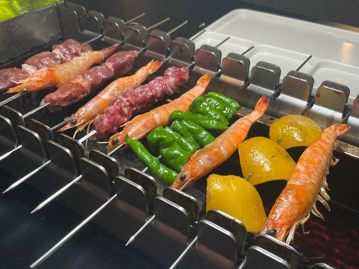 西門町羊騷殿 貼心的自動烤肉機 讓你解放雙手 享受用餐愜意時